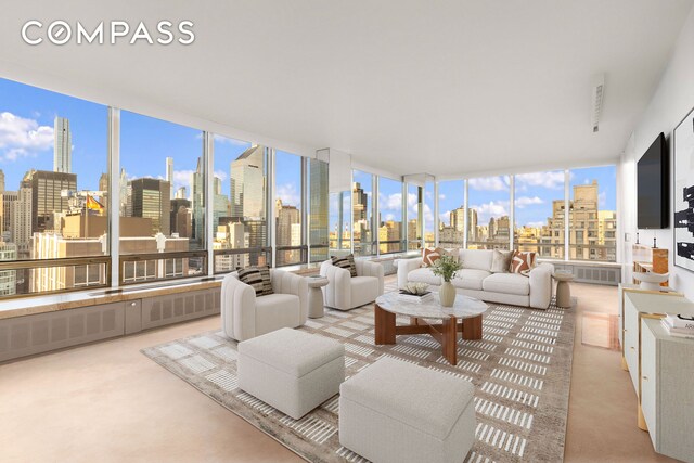 living room with a wall of windows, a city view, and light carpet
