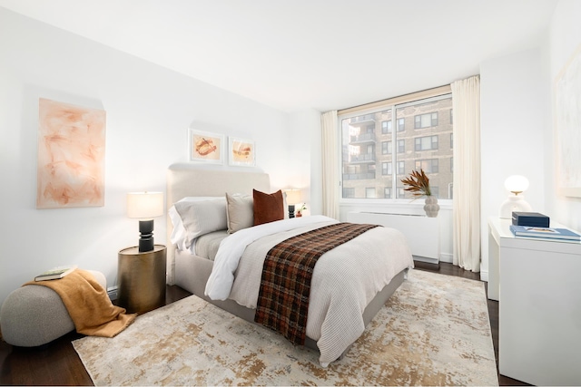 bedroom with wood finished floors