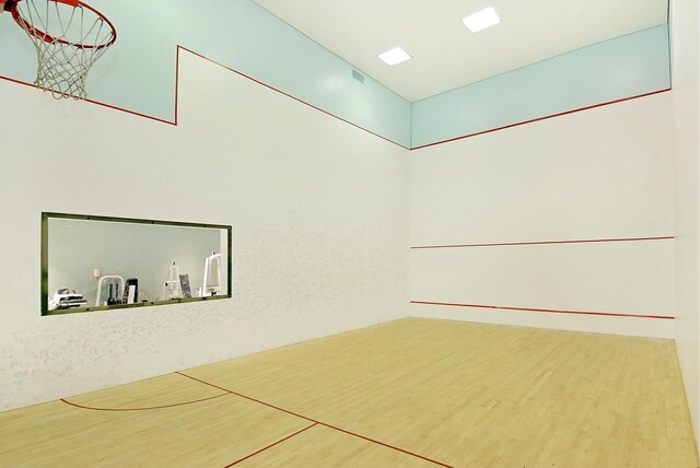 workout area with recessed lighting, visible vents, carpet, and floor to ceiling windows