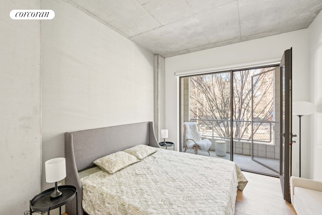 450 Warren St Twoc, Unit Twoc, New York City, NY 11217 - bedroom with wood finished floors, multiple windows, and access to exterior