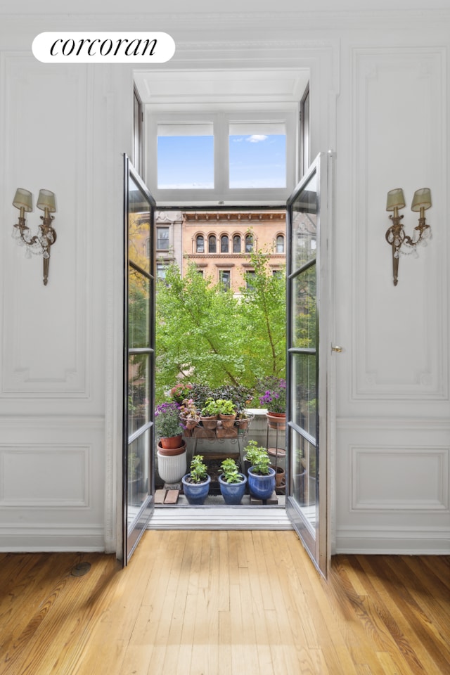 doorway featuring wood finished floors