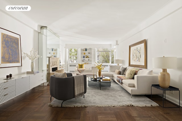 living area featuring a fireplace and visible vents