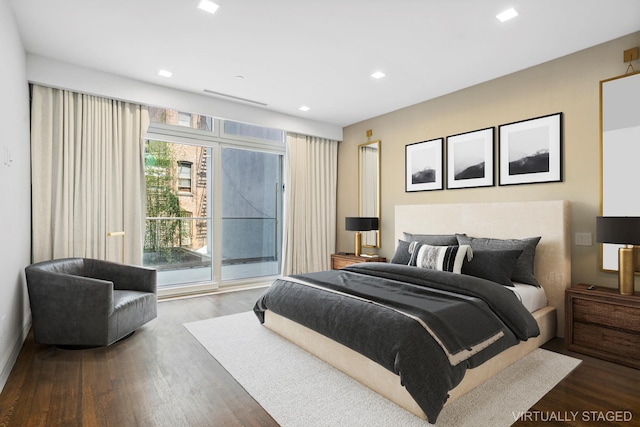 bedroom with access to exterior, wood finished floors, and recessed lighting