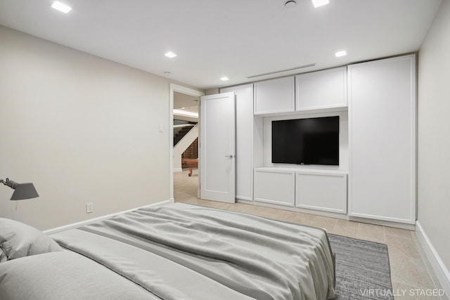 bedroom with recessed lighting, visible vents, and baseboards