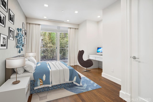 bedroom with recessed lighting, baseboards, built in desk, and wood finished floors