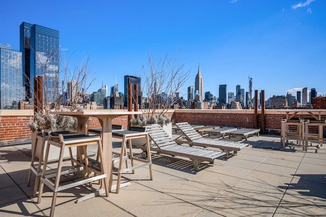 view of patio featuring a city view