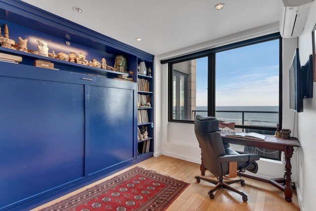 91-16 Shore Front Pkwy Unit 6H, New York City, NY 11693 - office area featuring hardwood / wood-style floors, a water view, and recessed lighting