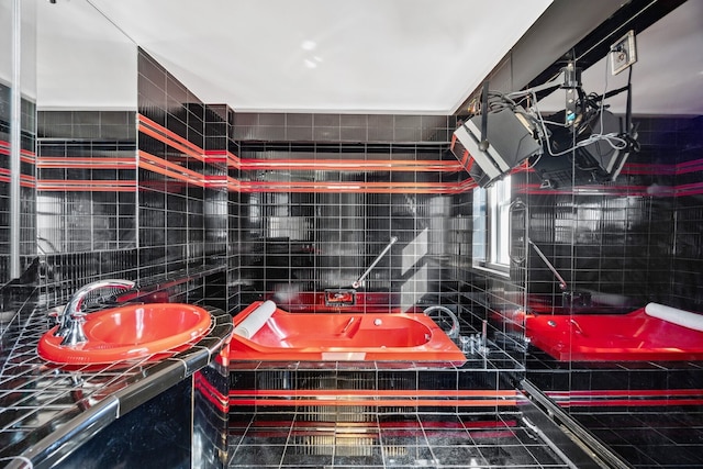 75 E End Ave Unit 19C, New York City, NY 10028 - bathroom with a garden tub, decorative backsplash, and a sink
