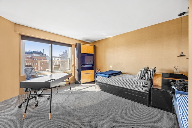 75 E End Ave Unit 19C, New York City, NY 10028 - bedroom with carpet flooring, a desk, and a view of city