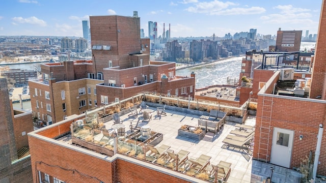 75 E End Ave Unit 19C, New York City, NY 10028 - view of city skyline featuring a large body of water