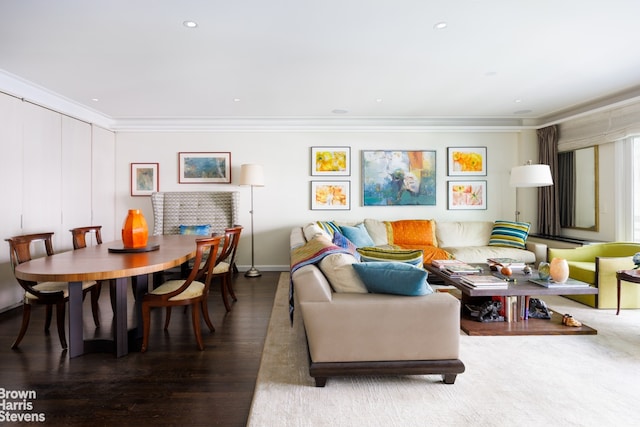 living room with ornamental molding, wood finished floors, and recessed lighting