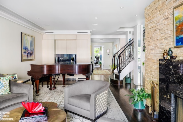 living area featuring stairs, recessed lighting, and wood finished floors