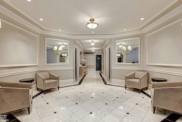 community lobby with crown molding and recessed lighting