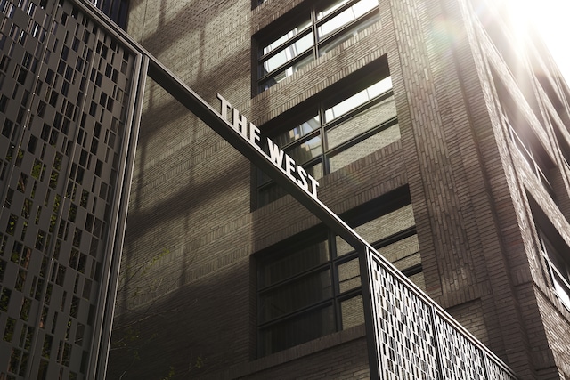 staircase with a high ceiling