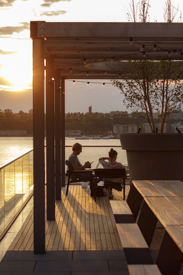 wooden terrace with a water view