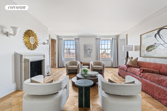 living room featuring ornamental molding, visible vents, a fireplace, and baseboards