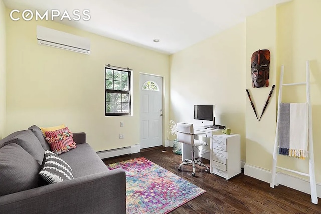 home office with baseboards, wood finished floors, a wall unit AC, and a baseboard radiator