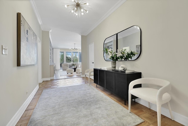 hallway with a chandelier, ornamental molding, and baseboards