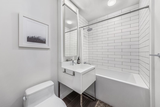 full bathroom featuring shower / tub combo, vanity, and toilet