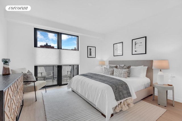 24 Huntington St, New York City, NY 11231 - bedroom featuring light wood finished floors and access to outside