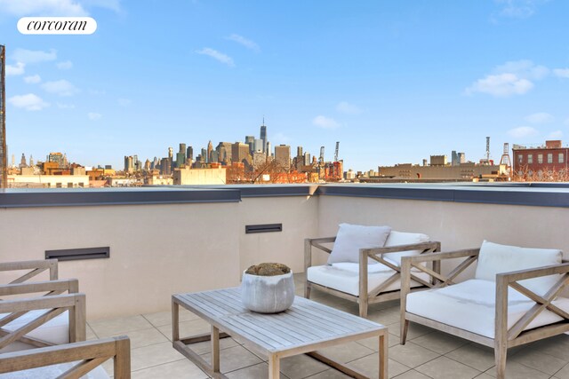 24 Huntington St, New York City, NY 11231 - view of patio / terrace with a skyline view