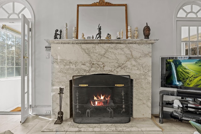 interior details with a premium fireplace