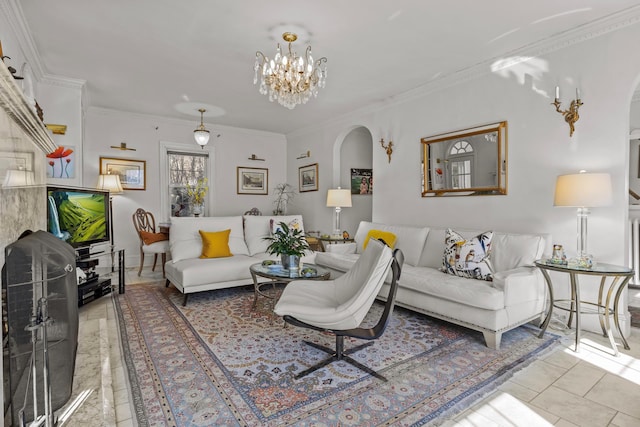 living room featuring arched walkways, a chandelier, and ornamental molding