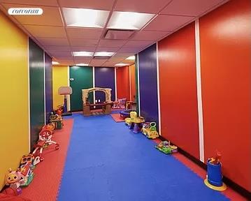 1485 5th Ave Unit 16E, New York City, NY 10035 - exercise room featuring visible vents and a paneled ceiling