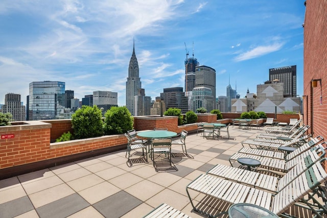 view of patio / terrace with a city view