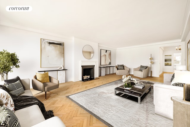 living room with ornamental molding, visible vents, and a fireplace