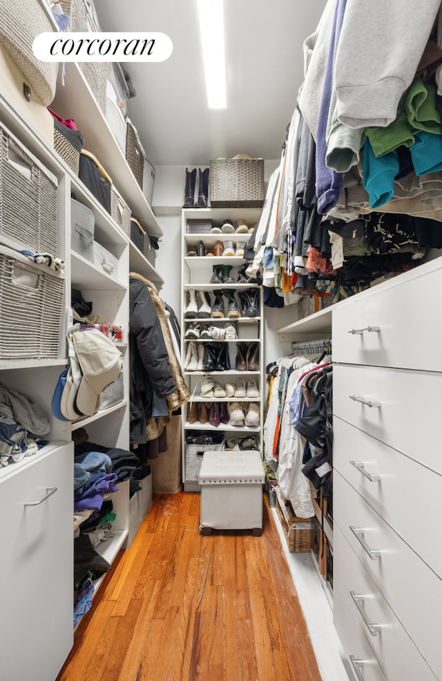 walk in closet featuring light wood-style floors