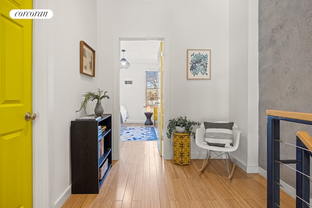 interior space with light wood-style flooring and baseboards