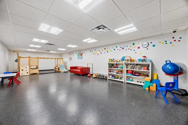 interior space featuring a paneled ceiling and visible vents