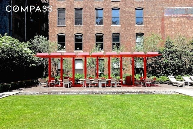 101 W 24th St Unit 19B, New York City, NY 10011 - view of property's community featuring a yard