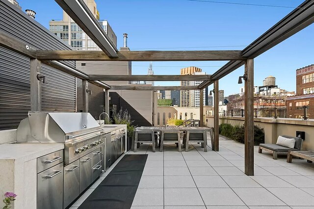 404 Park Ave S Unit 8/D, New York City, NY 10016 - view of patio / terrace with grilling area, a view of city, area for grilling, and outdoor dining space