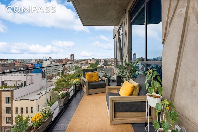 balcony featuring a city view