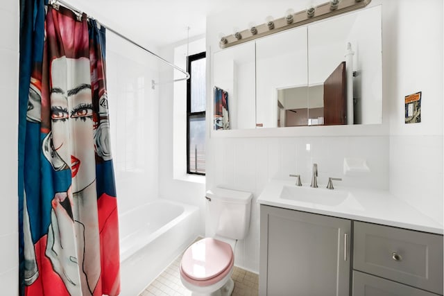 185 E 2nd St Unit 5A, New York City, NY 10009 - full bathroom featuring vanity, toilet, shower / bathtub combination with curtain, and tile patterned flooring