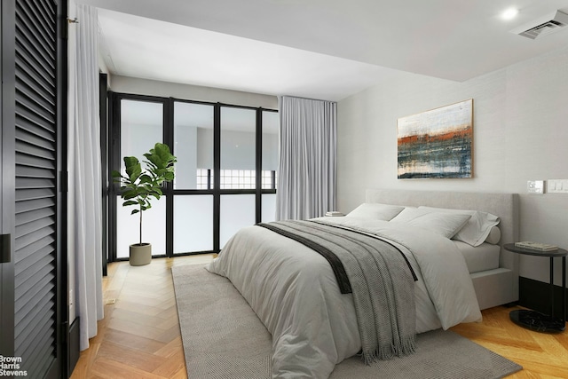 bedroom featuring visible vents