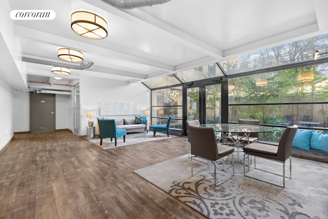 sunroom / solarium with beamed ceiling and visible vents