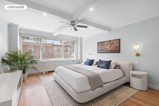 bedroom featuring crown molding, light wood finished floors, beam ceiling, and visible vents