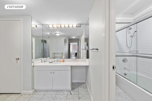full bath featuring baseboards, visible vents, combined bath / shower with glass door, and marble finish floor