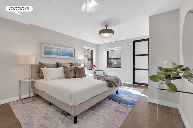 30 W 86th St Unit 2B, New York City, NY 10024 - bedroom featuring baseboards and wood finished floors