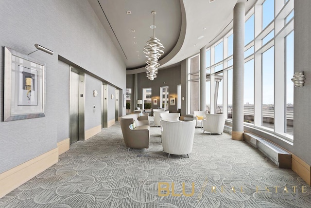community lobby with a high ceiling