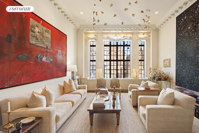 living area with ornamental molding