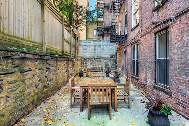 view of patio featuring outdoor dining space