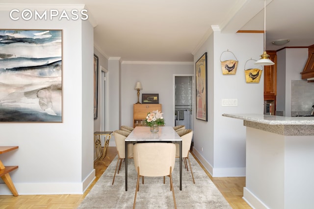132 E 35th St Unit 7H, New York City, NY 10016 - dining room with crown molding and baseboards