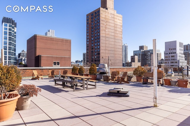 132 E 35th St Unit 7H, New York City, NY 10016 - view of patio / terrace featuring a view of skyline