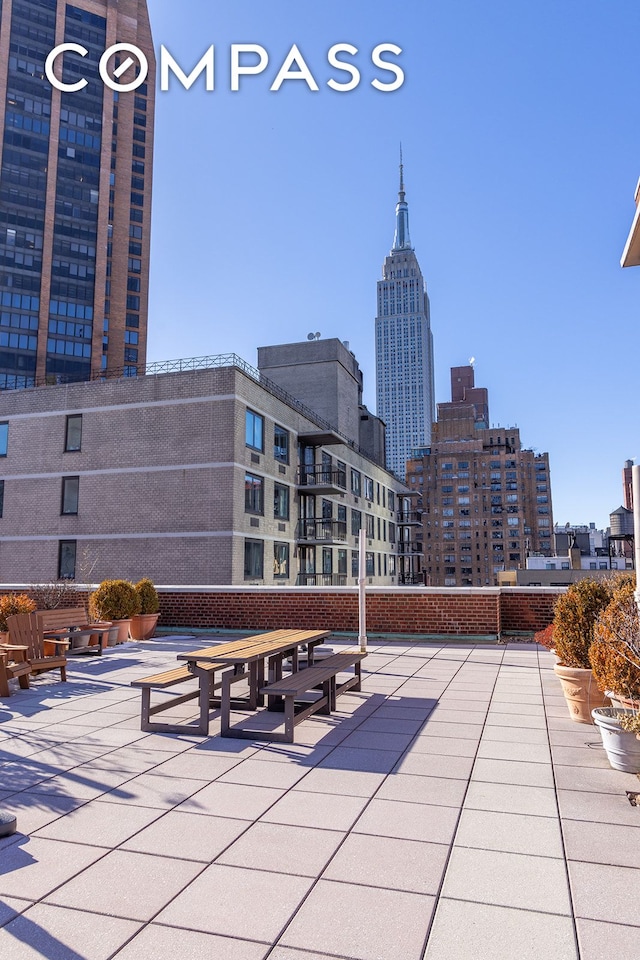 132 E 35th St Unit 7H, New York City, NY 10016 - view of community with a city view