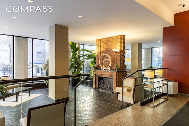 132 E 35th St Unit 7H, New York City, NY 10016 - common area featuring floor to ceiling windows and a security system