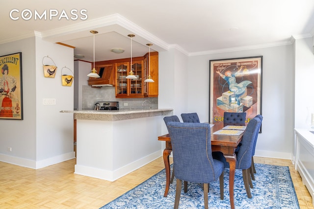 132 E 35th St Unit 7H, New York City, NY 10016 - dining area with crown molding and baseboards